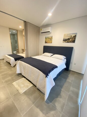 Imagen de la habitación del Hotel Salguero Suites. Foto 20