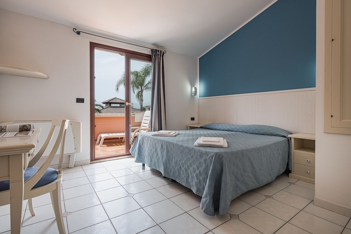 Imagen de la habitación del Hotel Salice Resort. Foto 17