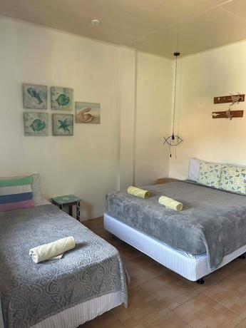Imagen de la habitación del Hotel Saltitude Dive and Beach Resort. Foto 6