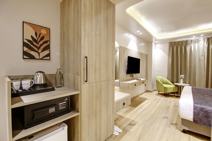 Imagen de la habitación del Hotel Saltstayz Premier - Near Golf Course Road and Sector 57. Foto 3