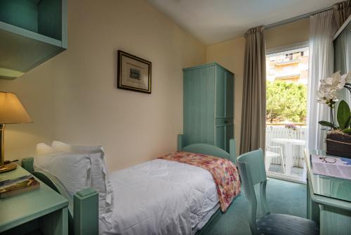 Imagen de la habitación del Hotel Salus Smart and Chic. Foto 6