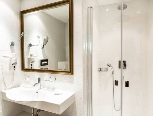 Imagen de la habitación del Hotel Salzburg Holznerwirt. Foto 6