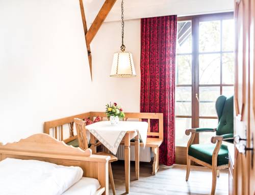 Imagen de la habitación del Hotel Salzburg Holznerwirt. Foto 11