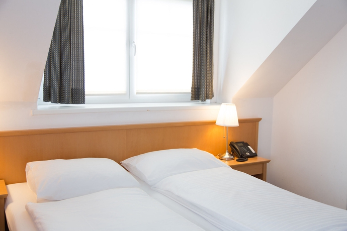 Imagen de la habitación del Hotel Salzburg Lilienhof. Foto 4