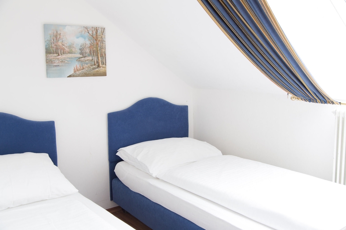 Imagen de la habitación del Hotel Salzburg Lilienhof. Foto 7