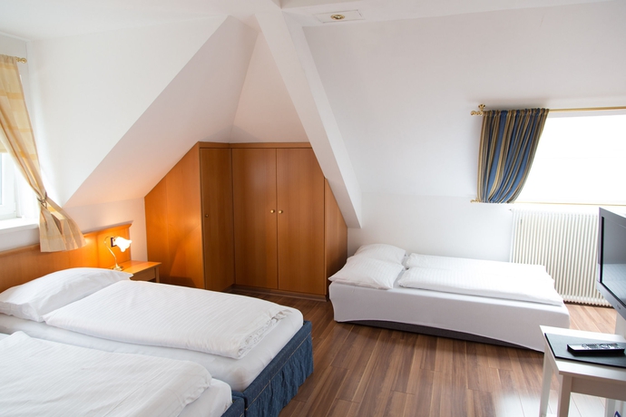 Imagen de la habitación del Hotel Salzburg Lilienhof. Foto 9