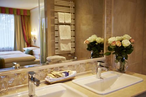 Imagen de la habitación del Hotel Salzburgerhof. Foto 4