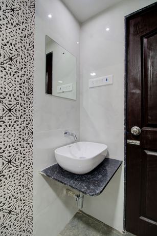 Imagen de la habitación del Hotel Samaira Residency. Foto 3