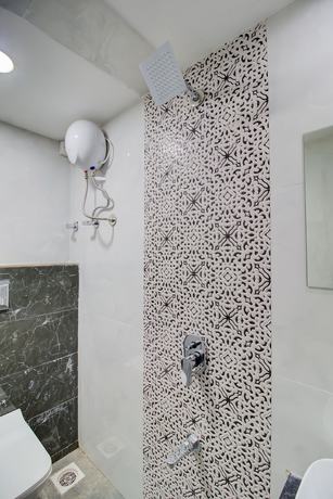 Imagen de la habitación del Hotel Samaira Residency. Foto 9