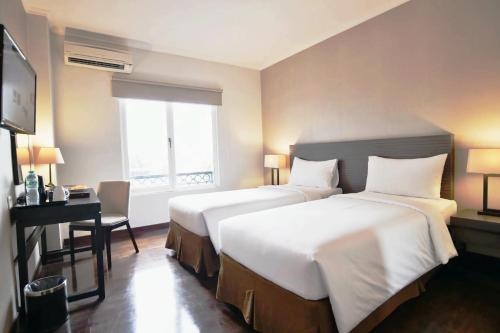Imagen de la habitación del Hotel Samala Jakarta Cengkareng. Foto 7