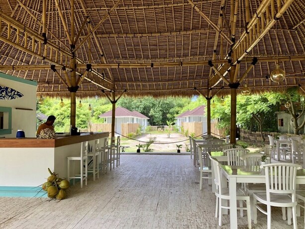 Imagen del bar/restaurante del Hotel Samalas Boutique resort & Private Pool Villas. Foto 26