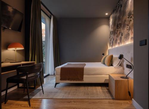 Imagen de la habitación del Hotel Saman Boutique. Foto 9