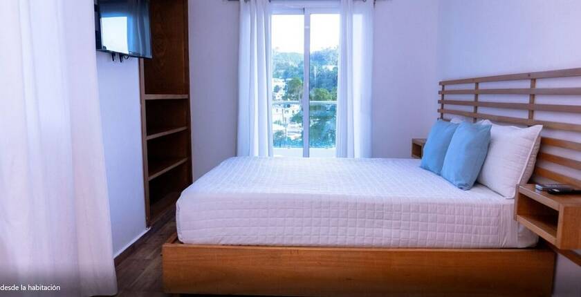 Imagen de la habitación del Hotel Samana Suites. Foto 19