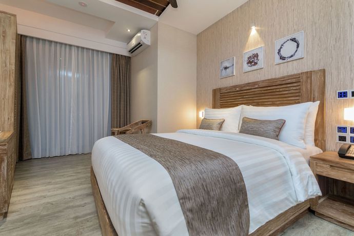 Imagen de la habitación del Hotel Samann Grand. Foto 2