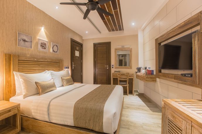 Imagen de la habitación del Hotel Samann Grand. Foto 5