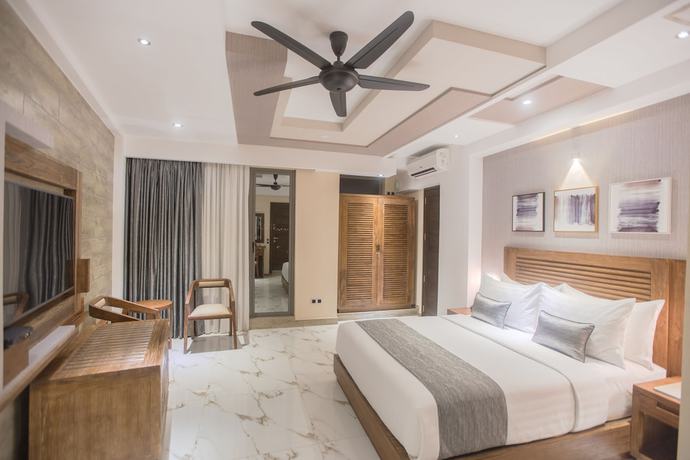 Imagen de la habitación del Hotel Samann Grand. Foto 8