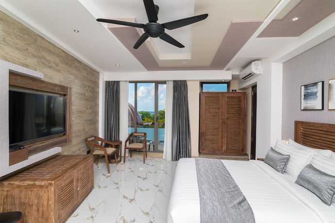 Imagen de la habitación del Hotel Samann Grand. Foto 10