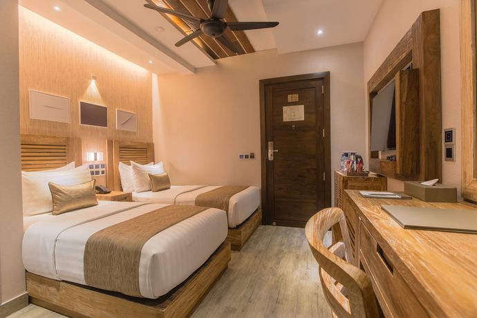 Imagen de la habitación del Hotel Samann Grand. Foto 12