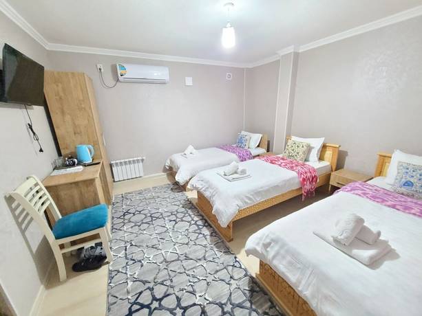 Imagen de la habitación del Hotel Samarkand City Center. Foto 4