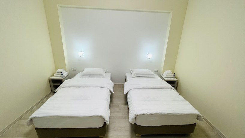 Imagen de la habitación del Hotel Samarkand Travel. Foto 4