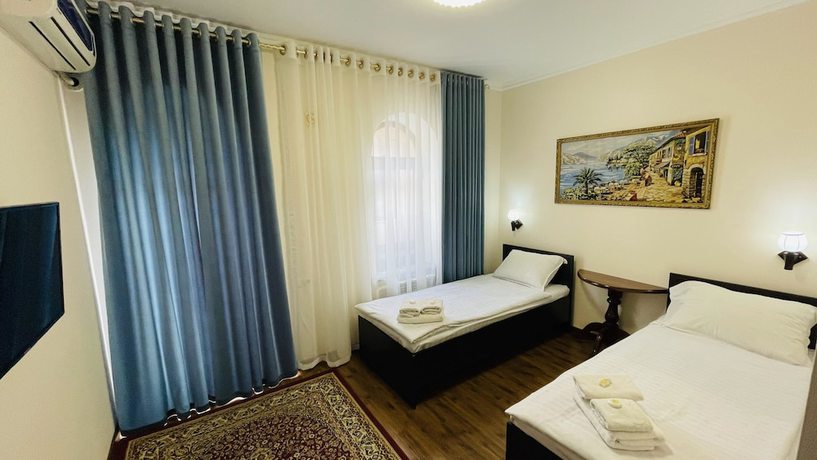Imagen de la habitación del Hotel Samarkand Travel. Foto 9
