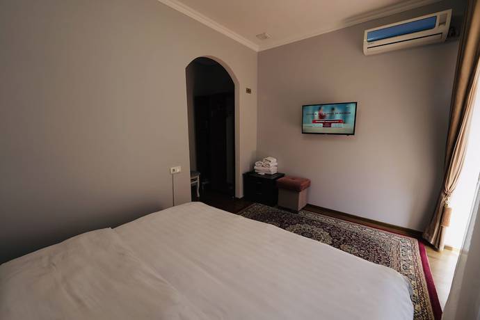 Imagen de la habitación del Hotel Samarkand Travel. Foto 13