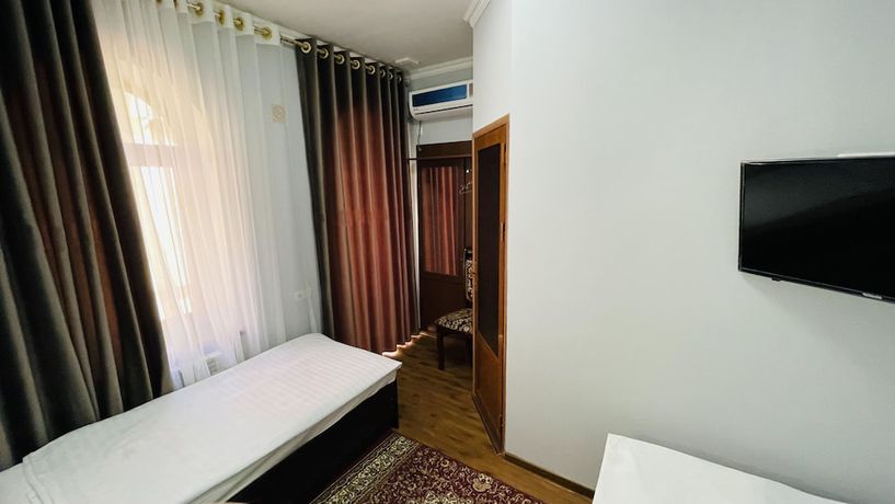 Imagen de la habitación del Hotel Samarkand Travel. Foto 14