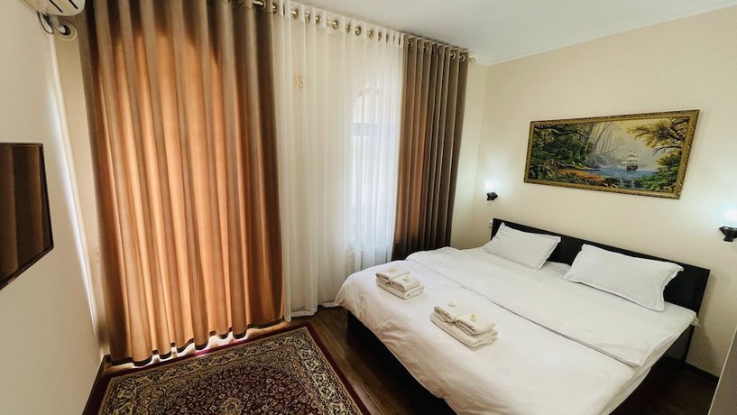 Imagen de la habitación del Hotel Samarkand Travel. Foto 15