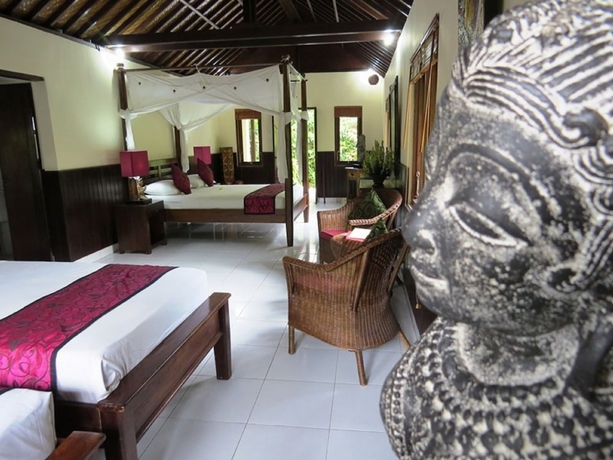 Imagen de la habitación del Hotel Sama's Cottages and Villas. Foto 12