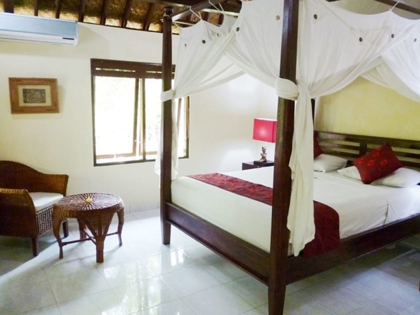 Imagen de la habitación del Hotel Sama's Cottages and Villas. Foto 13