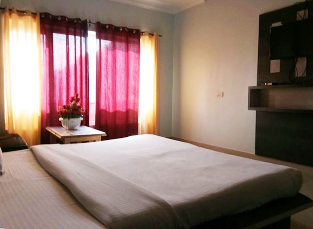 Imagen de la habitación del Hotel Sambyal Wings. Foto 8