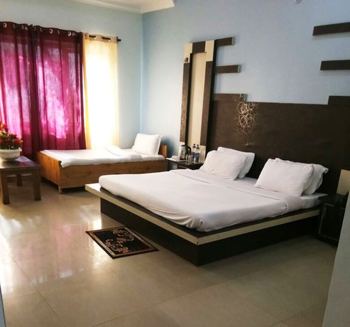 Imagen de la habitación del Hotel Sambyal Wings. Foto 9