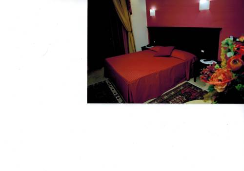 Imagen de la habitación del Hotel Sammartano Hotels. Foto 4