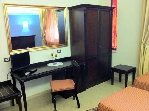 Imagen de la habitación del Hotel Sammartano Hotels. Foto 8