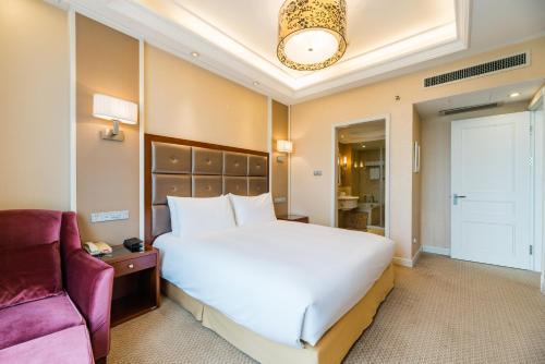 Imagen de la habitación del Hotel S&N Chaohu. Foto 18