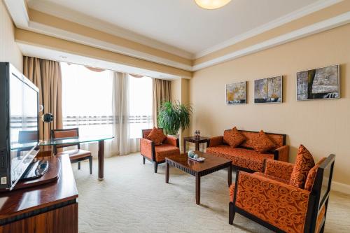 Imagen de la habitación del Hotel S&N Jiujiang. Foto 20