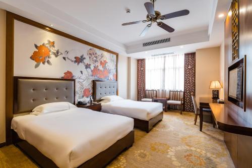 Imagen de la habitación del Hotel S&N Sanqingshan. Foto 16