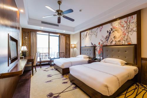 Imagen de la habitación del Hotel S&N Sanqingshan. Foto 17