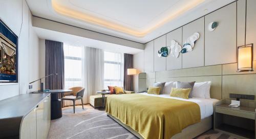 Imagen de la habitación del Hotel S&N Xuanting Anji. Foto 15