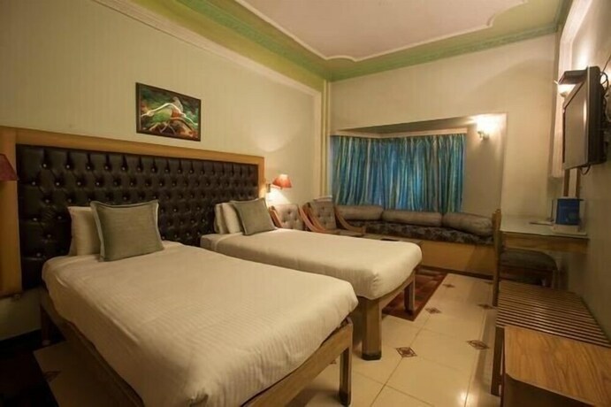 Imagen de la habitación del Hotel Samrat International, Patna. Foto 8