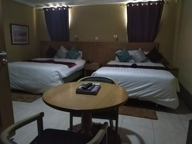 Imagen de la habitación del Hotel Sam\'s Cottage. Foto 15