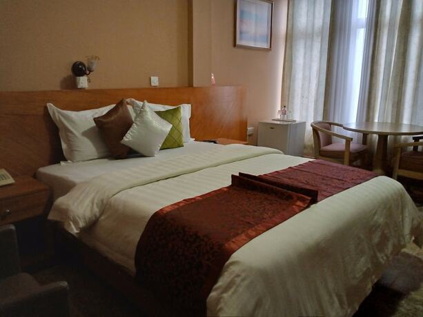 Imagen de la habitación del Hotel Sam\'s Cottage. Foto 19