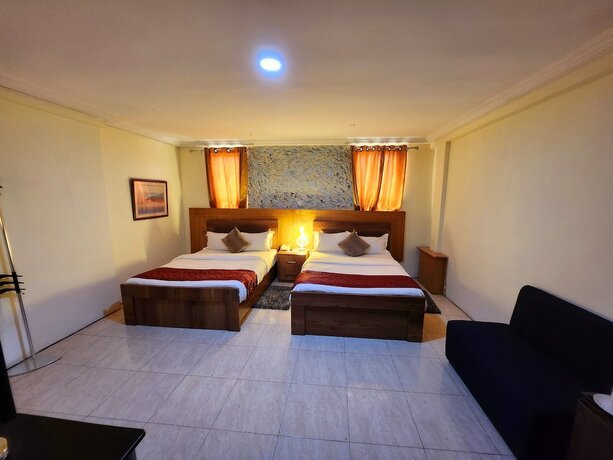 Imagen de la habitación del Hotel Sam\'s Cottage. Foto 20