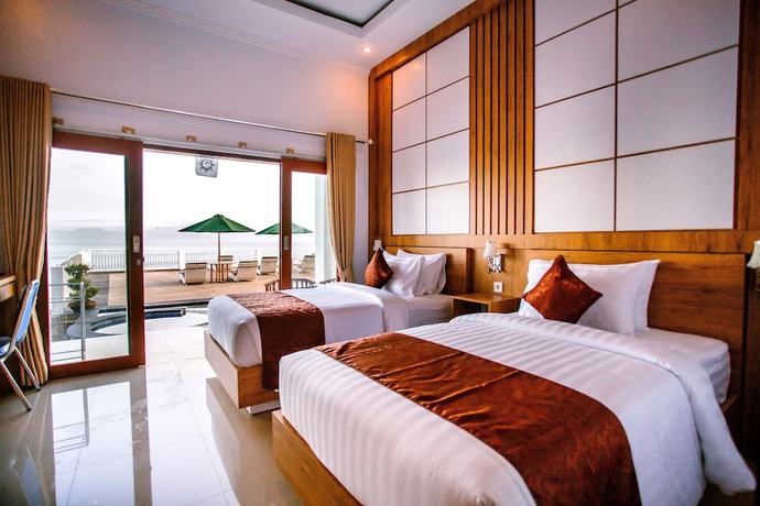 Imagen de la habitación del Hotel Samuh Ocean Sunset Hotel. Foto 15