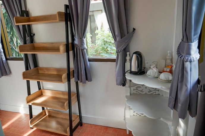 Imagen de la habitación del Hotel Samui Honey Cottages Beach Resort. Foto 3
