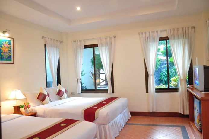 Imagen de la habitación del Hotel Samui Honey Cottages Beach Resort. Foto 5