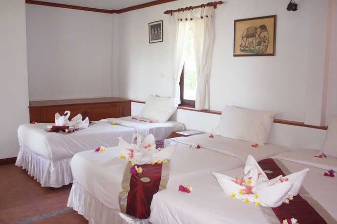 Imagen de la habitación del Hotel Samui Honey Cottages Beach Resort. Foto 7