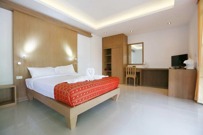 Imagen de la habitación del Hotel Samui Honey Cottages Beach Resort. Foto 9