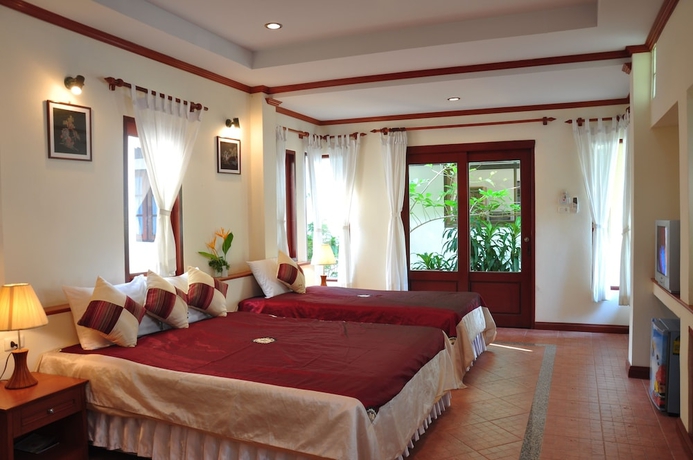 Imagen de la habitación del Hotel Samui Honey Cottages Beach Resort. Foto 10