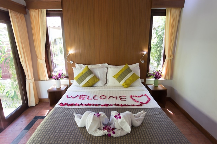 Imagen de la habitación del Hotel Samui Honey Cottages Beach Resort. Foto 14